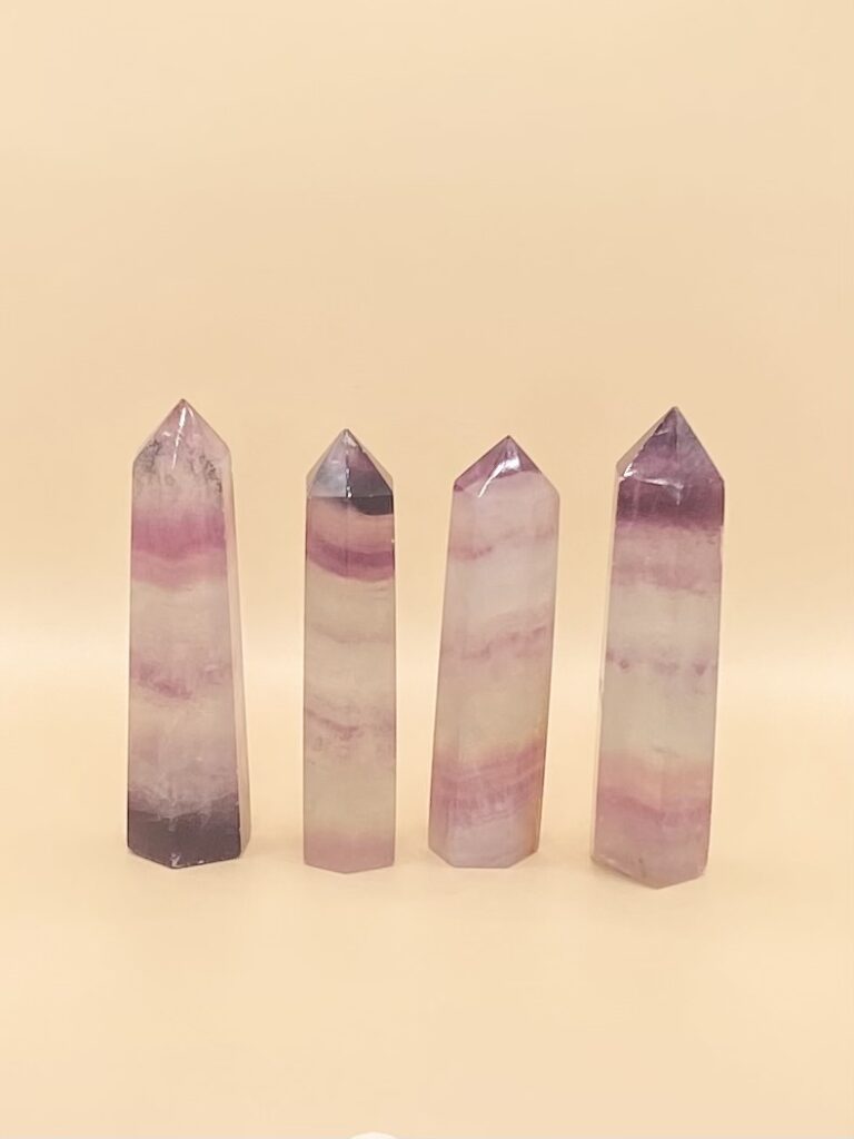 Rainbow Fluorite Tower crystal point.