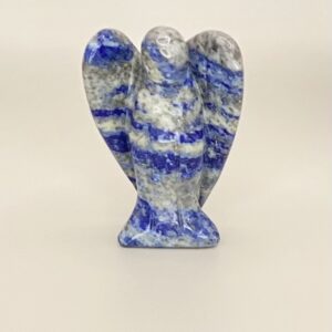 A Lapis Lazuli Angel figurine on a white surface.