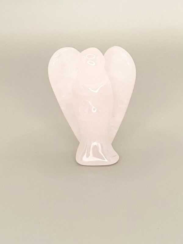 Pink rose quartz angel carving.