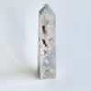 White and brown agate crystal obelisk.
