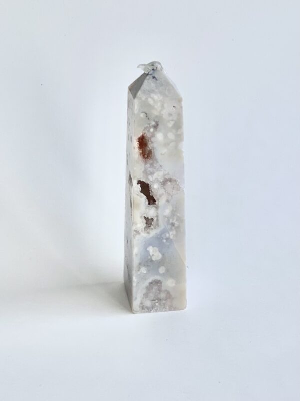 White and brown agate crystal obelisk.