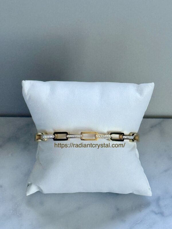 Gold and diamond chain bracelet.