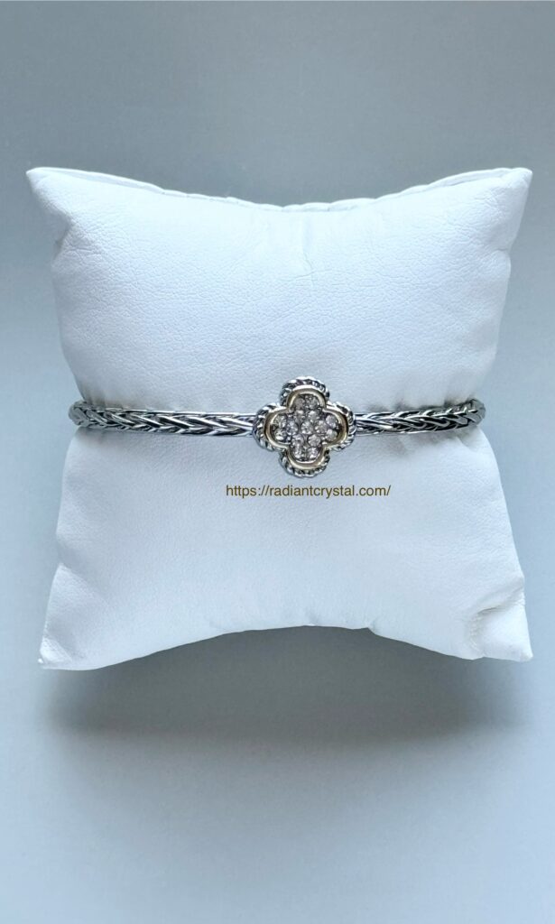 Silver and gold bracelet with diamonds.