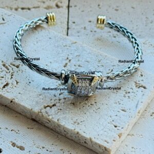 Braided cuff bracelet with crystal.