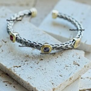 Braided gemstone bracelet in silver and gold.