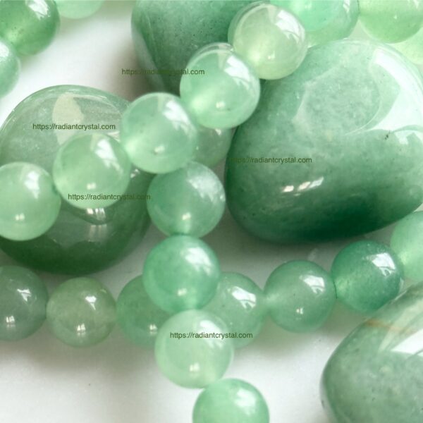 Green aventurine beads and stones.