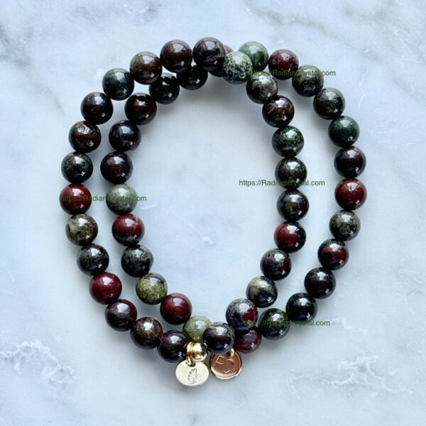 Red and green gemstone beaded bracelet.