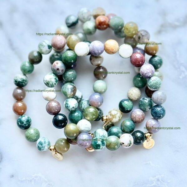 Three green agate beaded bracelets.