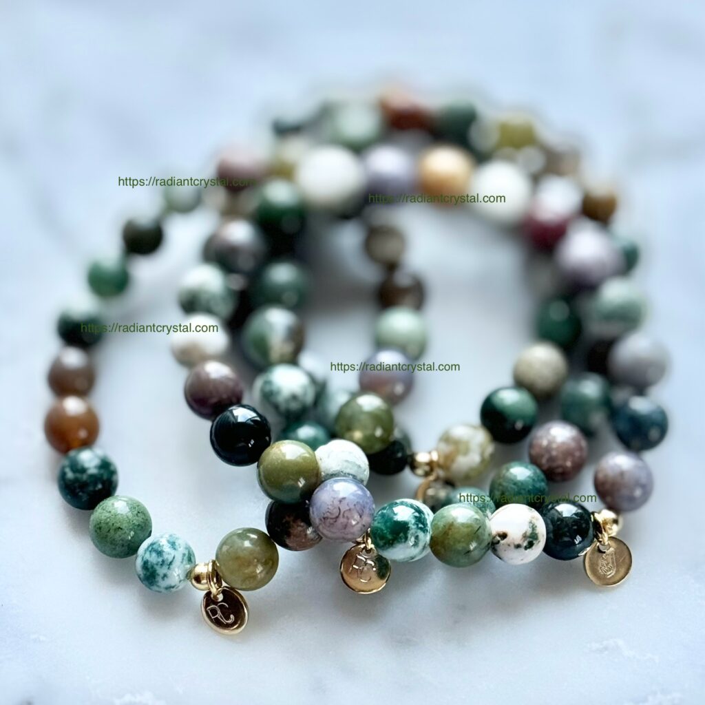 Three green agate beaded bracelets.