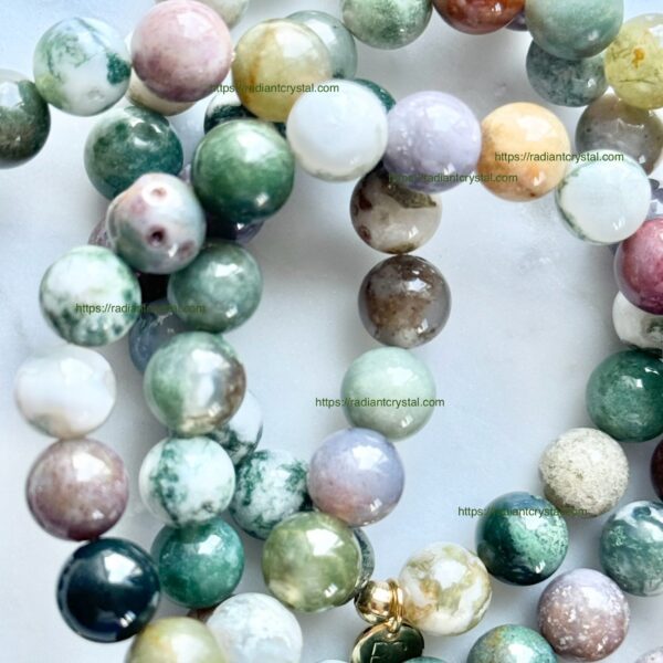 Green, brown, and white agate beads.