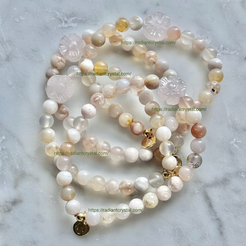 White agate beaded bracelets with gold accents.