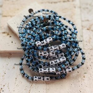 Stack of beaded AMEN bracelets.