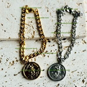 Gold and silver St. Michael bracelets.
