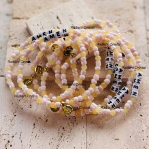 Pink & yellow beaded AMEN bracelets.