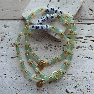 Green beaded bracelets with "Amen" charms.