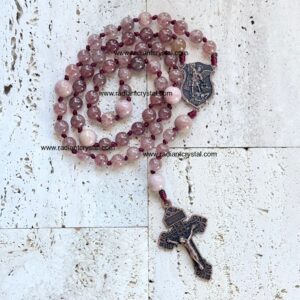 Rose quartz rosary with St. Michael medal.