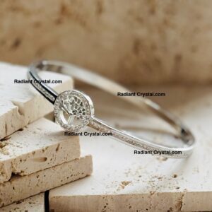 Silver bracelet with tree of life charm.