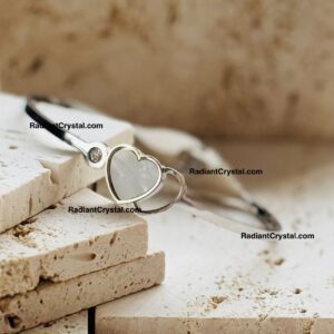 Silver heart bracelet with crystal.