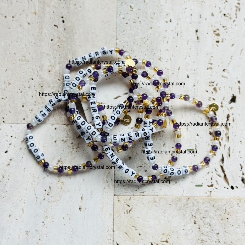 Beaded necklaces with "ENERGY" and "GOOD" text.