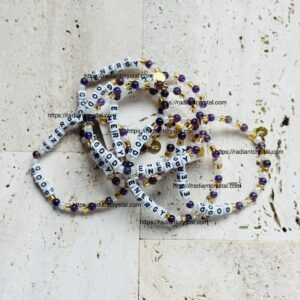 Beaded necklaces with "ENERGY" and "GOOD" text.