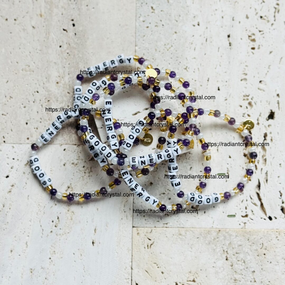 Beaded necklaces with "ENERGY" and "GOOD" text.