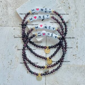 Beaded bracelets with "MONEY" letter beads.