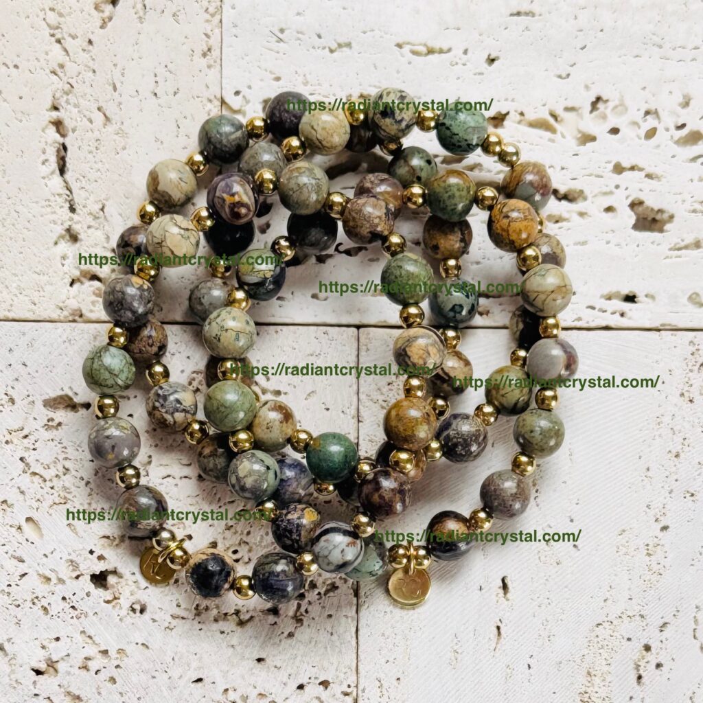 Beaded bracelets with mixed gemstones and gold accents.