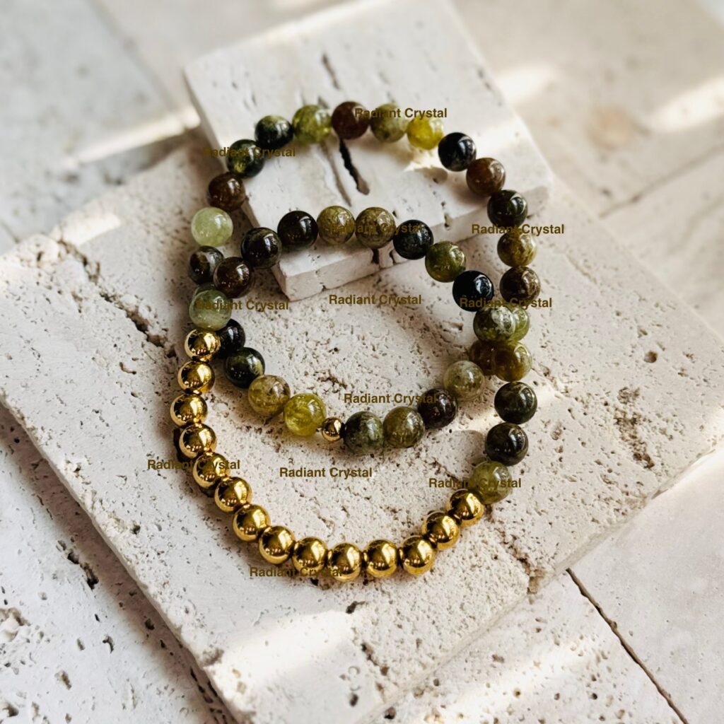 Beaded bracelets on textured white surface.